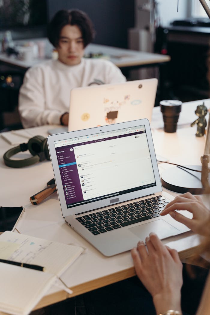 Crafting Captivating Headlines: Your awesome post title goes here Professional team collaborating through digital tools in a contemporary office environment.